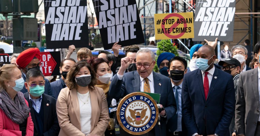 Senate Majority Leader Chuck Schumer, D-N.Y., center, is joined by U.S. Rep. Grace Meng, D-N.Y., third from left, at a news conference to discuss an Asian-American hate crime bill, Monday, April 19, 2021, in New York. Schumer is pushing for passage of the COVID-19 Hate Crimes Act in the Senate. (AP Photo/Mark Lennihan)