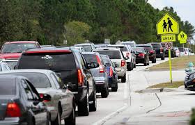 Students late for school due to traffic along Good Luck Road