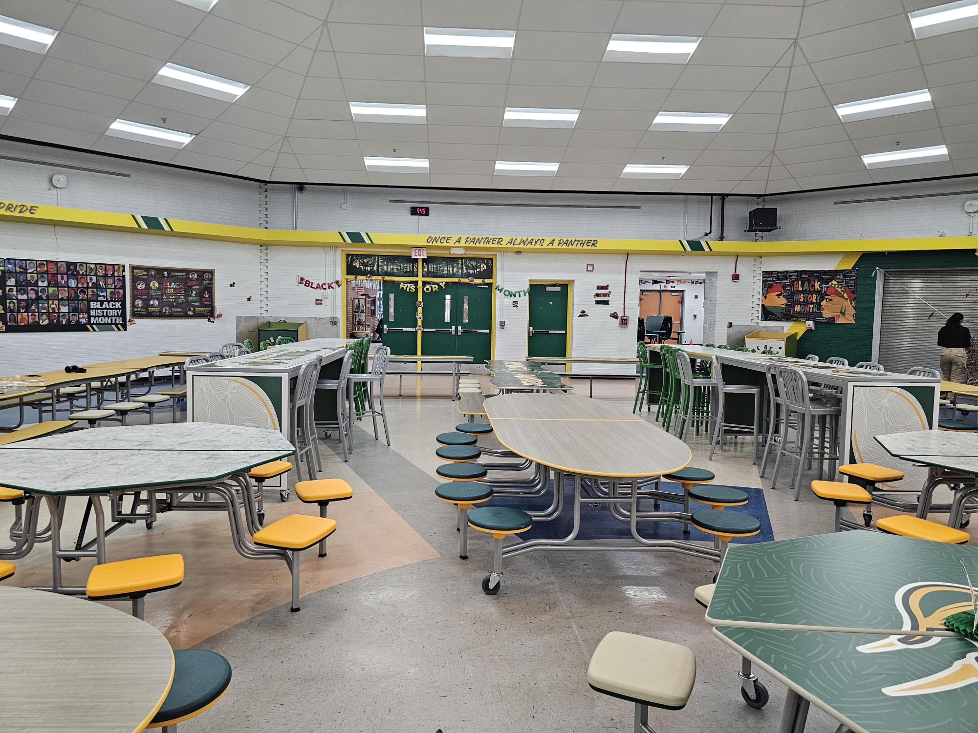 With varying table heights and lengths and barstools and attached seats, the new Parkdale cafeteria setup is bringing some modernization to the otherwise "older" school aesthetic. (photo by Genesis Salvador Flores)