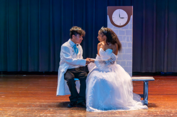 Prince Cristopher and Cinderella, played by James Dubon Garcia (left) and Kenya Ibe (right) respectively, share a moment at the ball. (photo courtesy of )